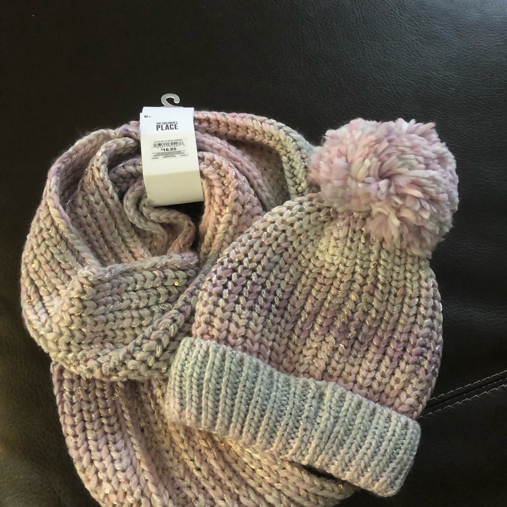 Warm and cozy! Silver and purple hat and infinity scarf.